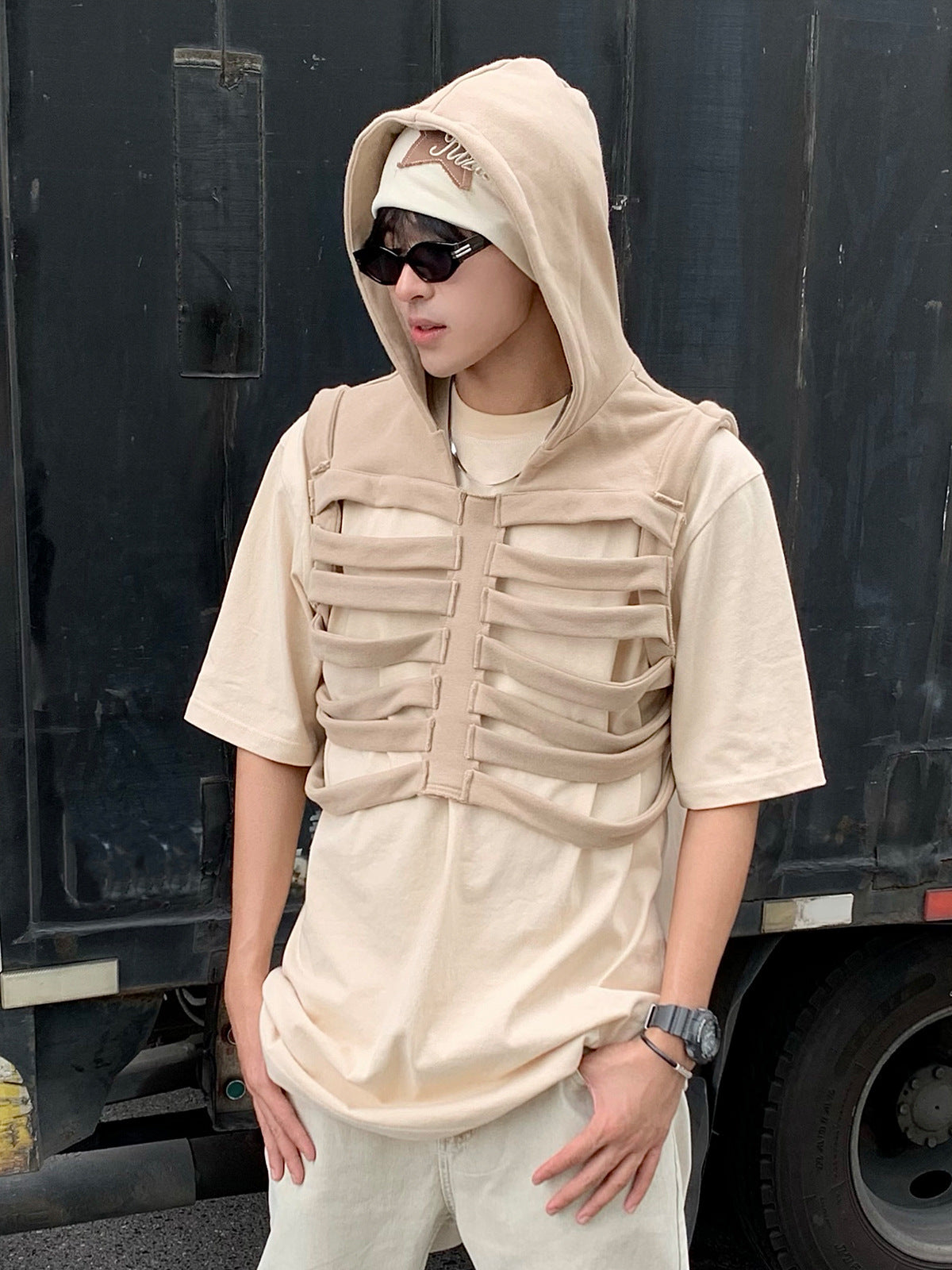Camiseta sin mangas con capucha, diseño holgado y versátil, estilo de diseñador