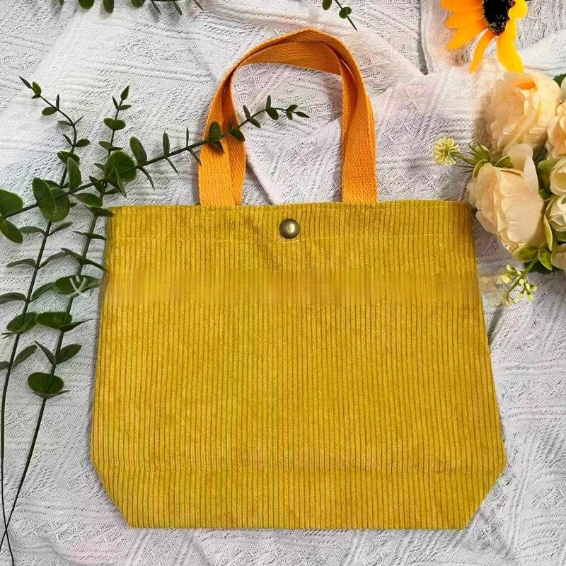 Bolso tote de estilo minimalista con hilo rugoso y estampados a doble cara, un bolso de lona versátil de gran capacidad para mujer