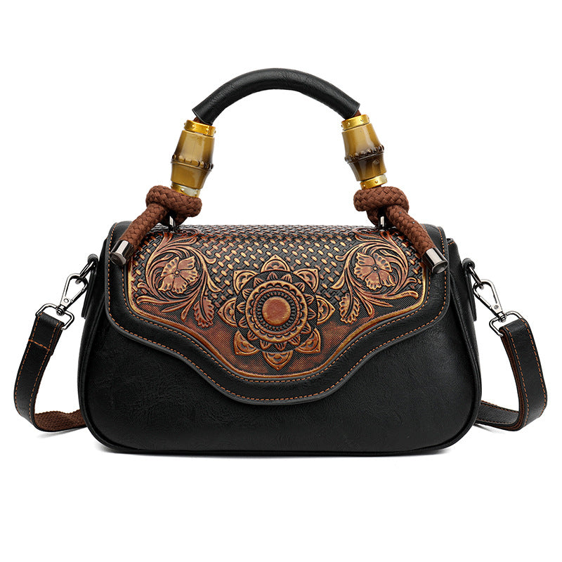 Bolso bandolera retro de cuero repujado artesanal