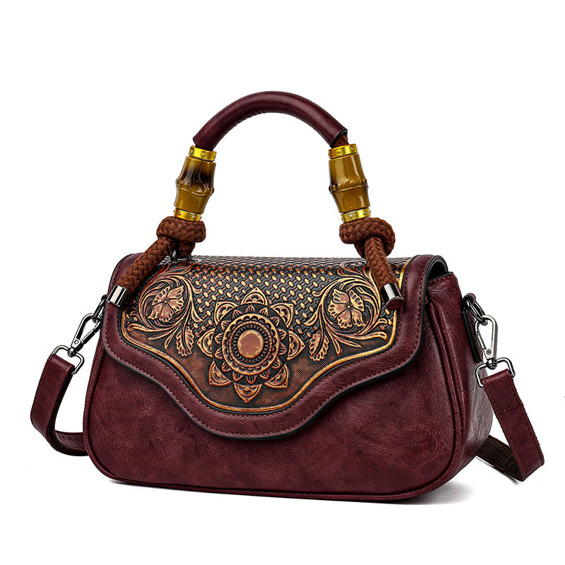 Bolso bandolera retro de cuero repujado artesanal