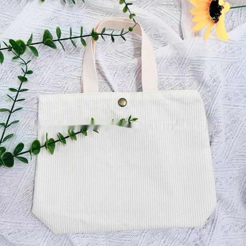 Bolso tote de estilo minimalista con hilo rugoso y estampados a doble cara, un bolso de lona versátil de gran capacidad para mujer