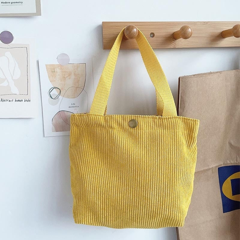 Bolso tote de estilo minimalista con hilo rugoso y estampados a doble cara, un bolso de lona versátil de gran capacidad para mujer