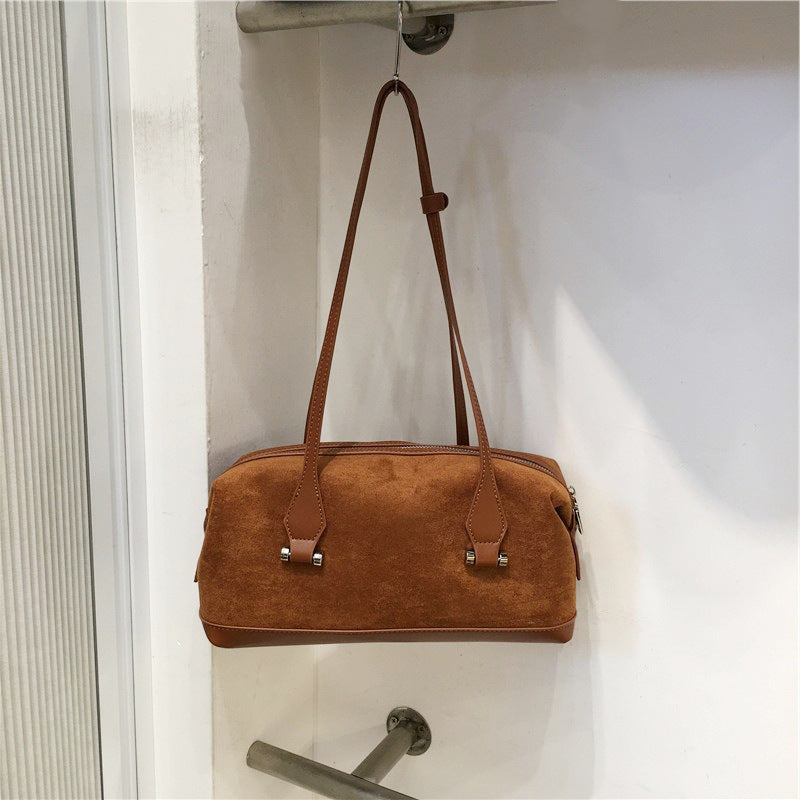 Bolso Boston de mano de ante retro para bolos